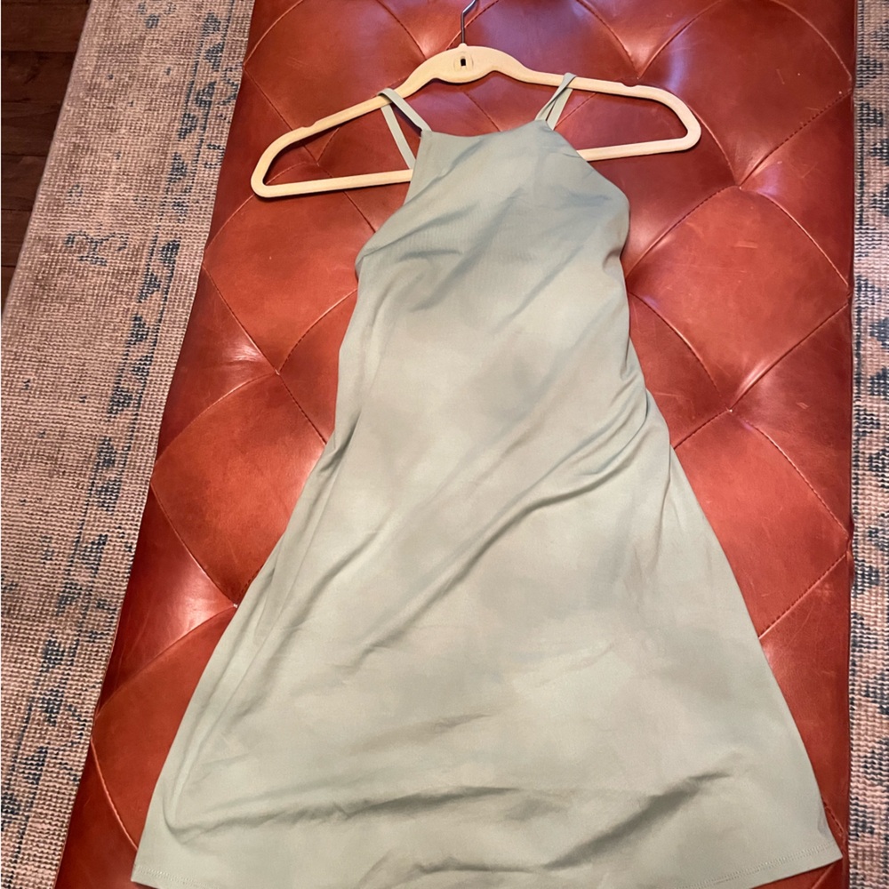 Never worn Madewell active dress. Built in shorts with pockets. Tags still on.